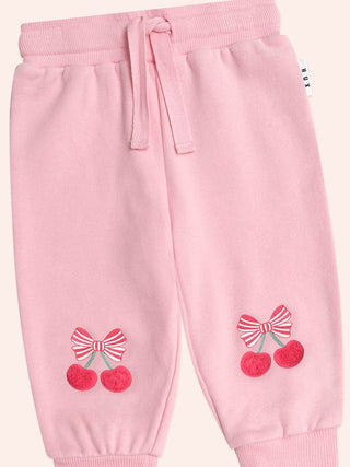 Hux Cherry Pie Track Pants in Apricot